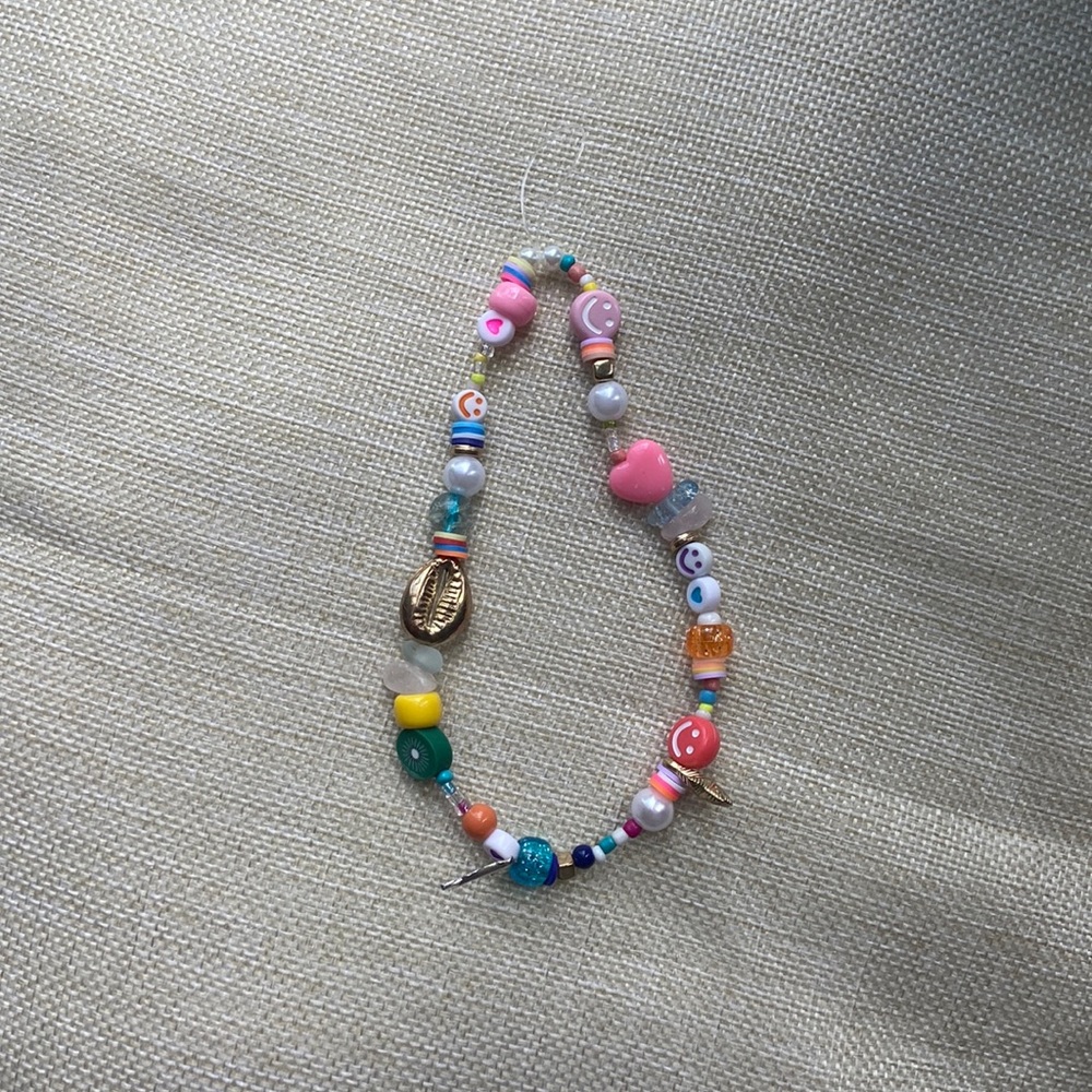 Handmade Small phone charm with a variety of beads and charms